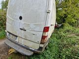 a van that is parked on the side of the road