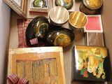 a box full of assorted items sitting on a table