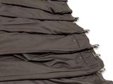a close up of a piece of cloth with zippers on it