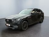 un SUV Mazda CX-HR noir garé dans un showroom