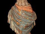 an old statue of a woman with a veil on her head