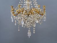 Lustre à 9 bras de lumières en métal doré à décor d'arabesqu… (photo 3)
