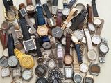 many different types of watches on the table