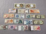 a lot of different types of money on the table