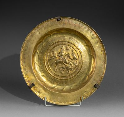 an image of a gold plate with a lion on it