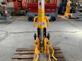 the fork is sitting on top of a pallet in a warehouse