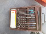 a box with a bunch of drill bits in it