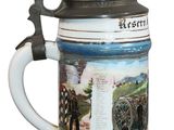 a beer mug with a picture of horses on it