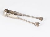 pair of silverware spoons on white surface with white background