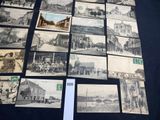 several old black and white photographs of buildings and buildings on display