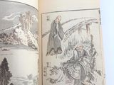 an open book with a picture of a man riding a horse