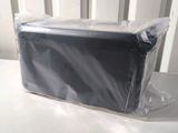a plastic bag sitting on top of a white table