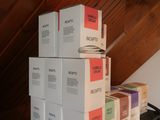 boxes stacked on top of each other on a table in a room