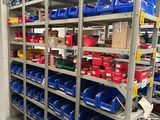 many bins on the shelves in the warehouse