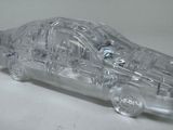 a clear car that is sitting on a table