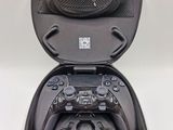 a black case with a controller inside of it