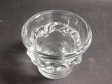 a glass of water sitting on a table