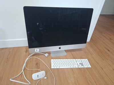 a computer monitor, keyboard, mouse and mouse on the floor