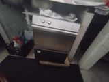 an image of a kitchen with a stove and a sink