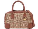 a brown and white handbag on a white background