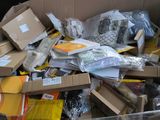 a cardboard box filled with many different types of items