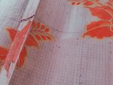 a close up of a fabric with a flower pattern on it