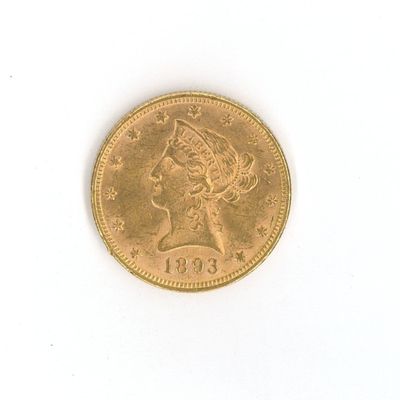 une pièce d'or ornée d'une tête de femme