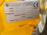 a close up of a label on a yellow machine