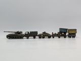 a toy truck with a tank on the back of it and a tank on the back of it