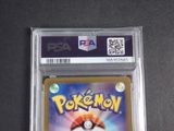 a close up of a pokemon trading card on a table