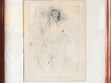 framed drawing of a woman sitting in a chair with her legs crossed