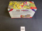 the box of the pokemon trading card game is sitting on the table