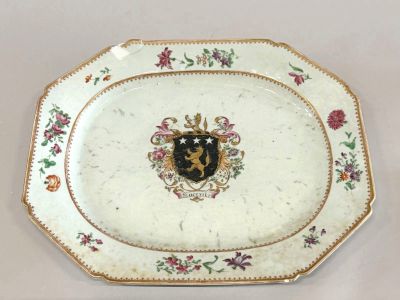 a plate with a coat of arms on it