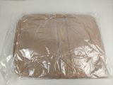 a plastic bag that has two pieces of clothing in it