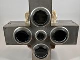 an image of a metal cross made out of pipes