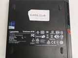 a black laptop with a sticker on it