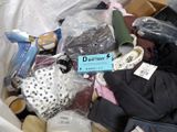 a pile of clothes and other items in a bin