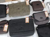 a lot of bags that are sitting on a table