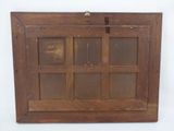 an old wooden window with glass panes on a white background