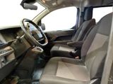 the interior of a car with the front seats folded down