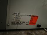 a label on the back of a machine that says tripla be