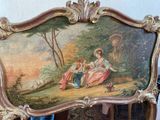a picture of a painting on the back of a chair