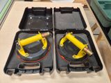 two yellow jacks sitting in a case on a table