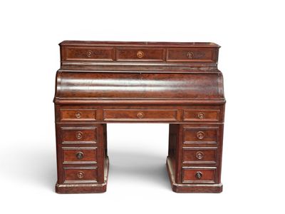an old wooden desk with drawers and drawers on top of it