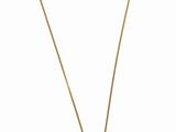 un collier en or orné d'un motif en noir et blanc