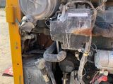 an image of a truck with its engine in the back of it