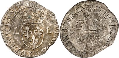une pièce d'argent représentant une couronne au recto et un bouclier au verso
