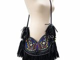 a black purse with fringes and beads on a mannequin torso
