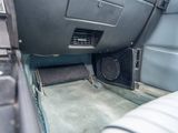 an image of a car dashboard with a speaker in the center