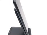 a cell phone that is sitting on top of a stand